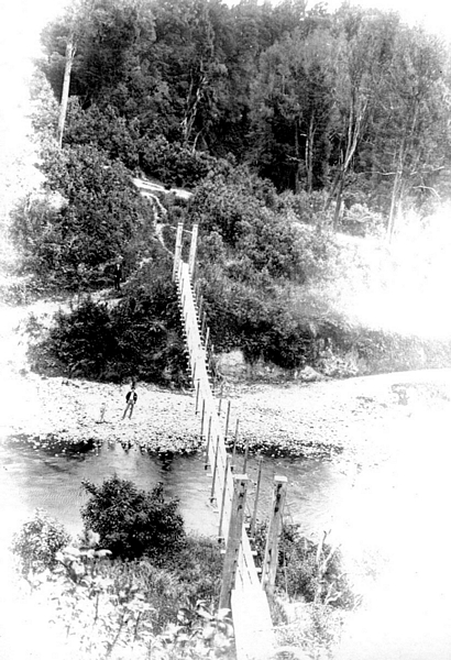 The old swingbridge across the Makakahi River: (Photo: Wairarapa Archives)